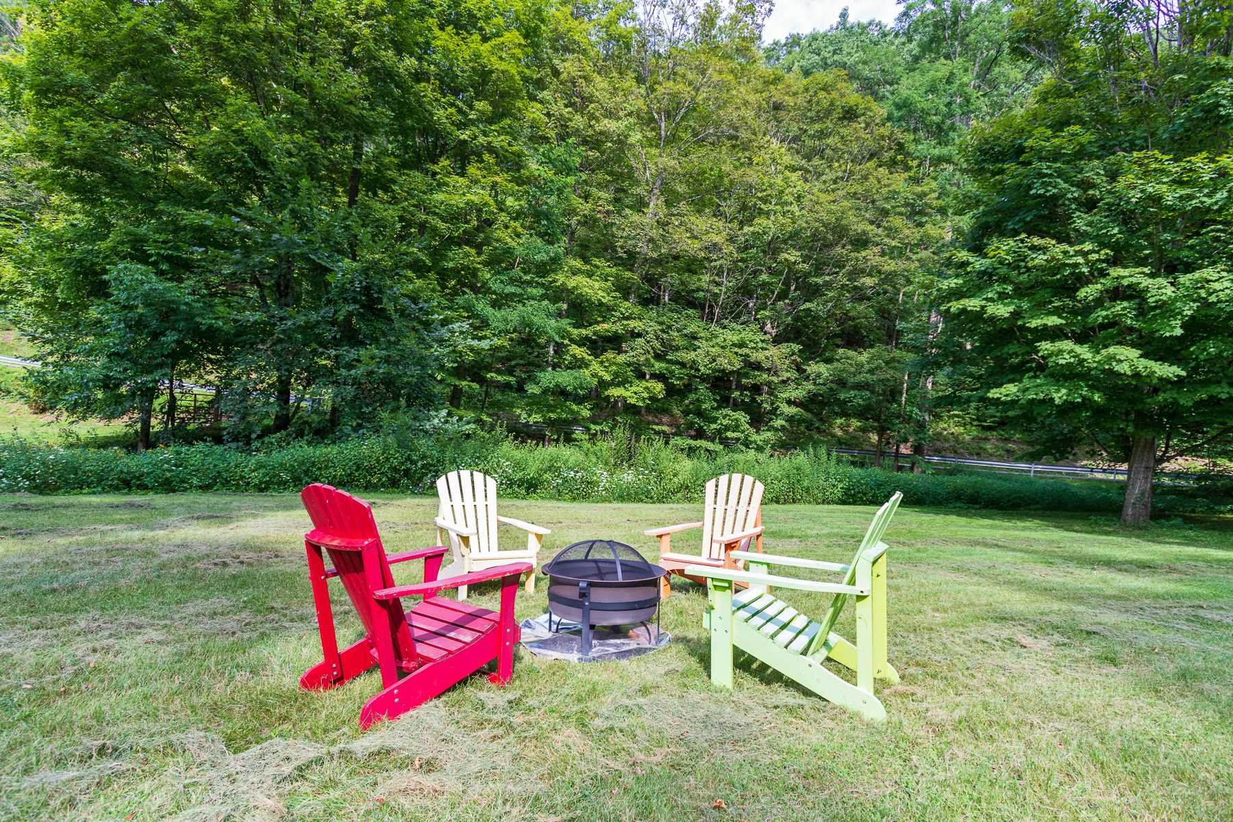 7 Finkle Road Pine Plains, NY 12546 - Photo 24 of 30 an outdoor sitting area with golf course