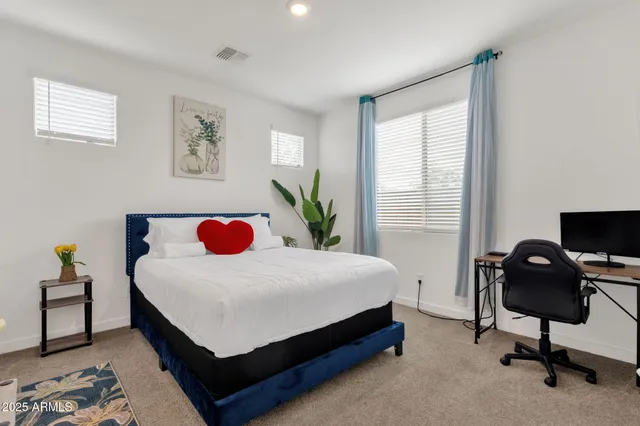 a view of a storage & utility room with a sink