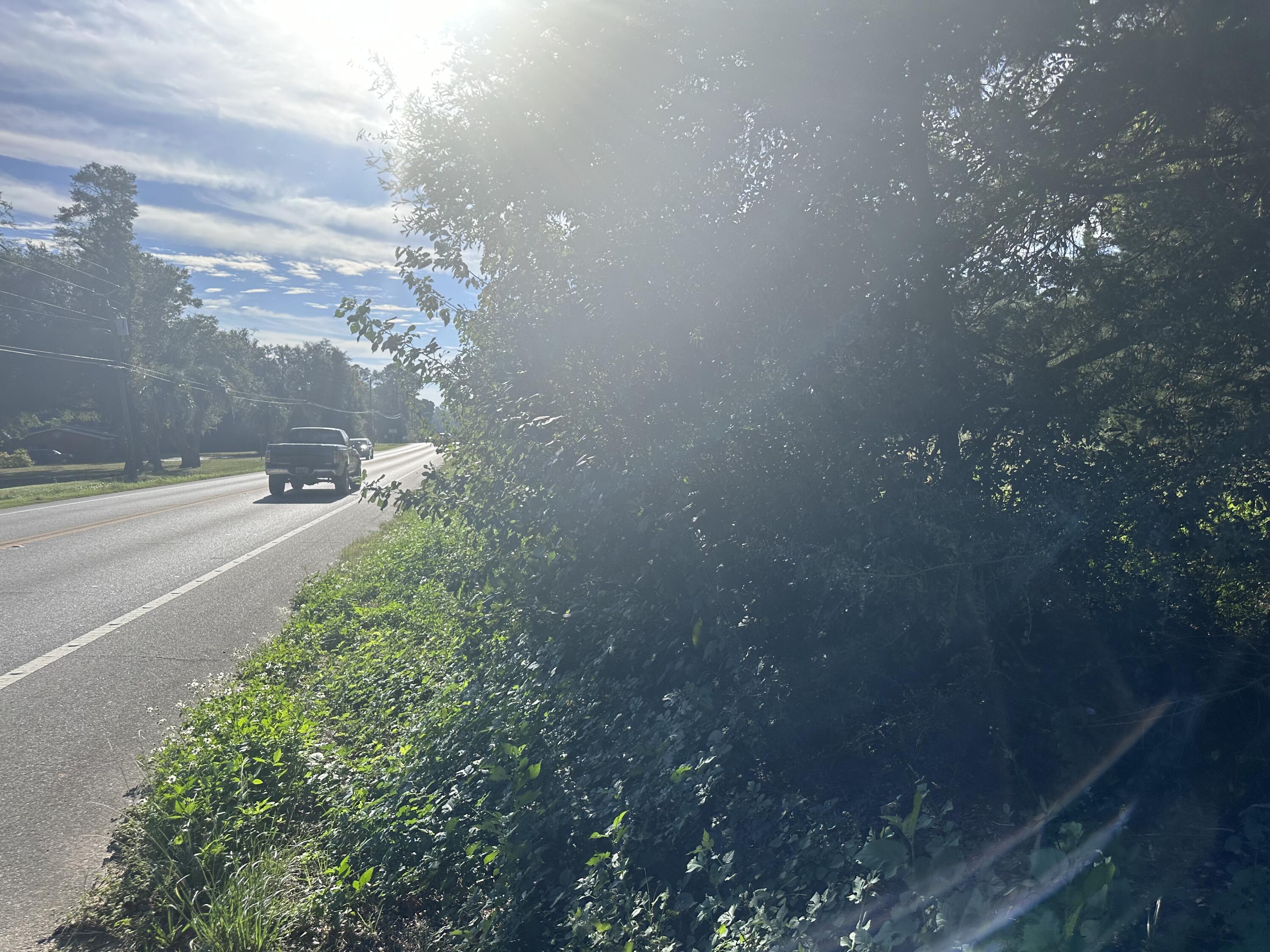 1816 Wadsworth Road Baker, FL 32531 - Photo 5 of 7 a view of a street with a building in the background