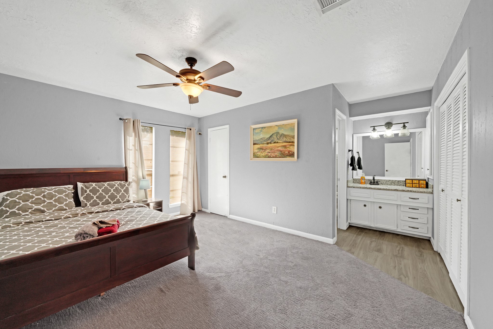 222 Wickhamford Way Houston, TX 77015 - Photo 17 of 27 a living room with furniture and a chandelier