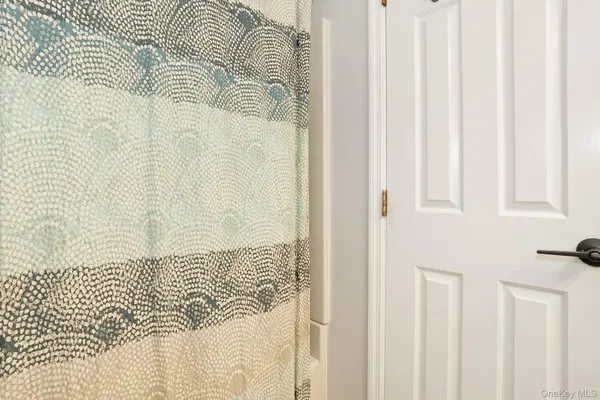 a living room with furniture window and a fireplace