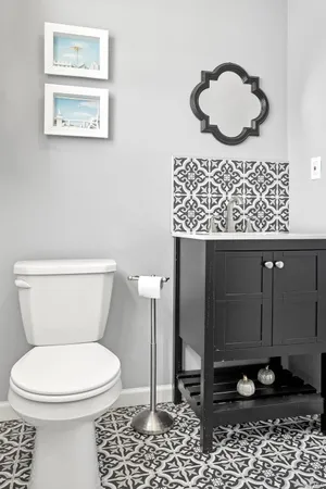 a view of a house with a yard and garage