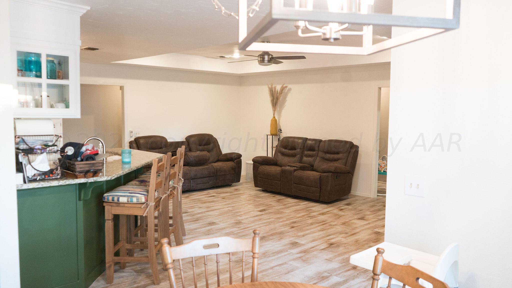 7513 Sheldon Road Amarillo, TX 79119 - Photo 11 of 27 kitchen/living room