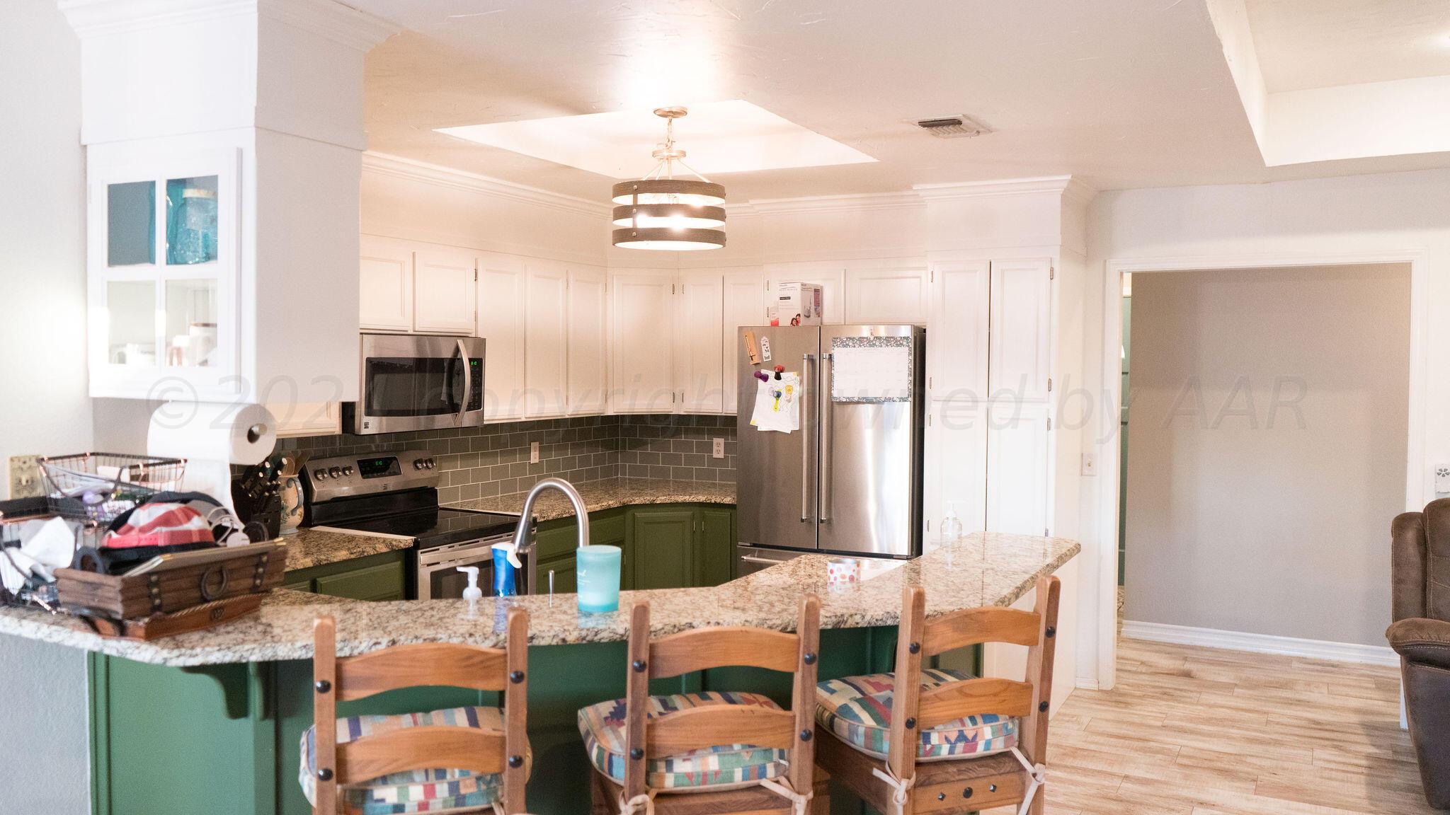 7513 Sheldon Road Amarillo, TX 79119 - Photo 6 of 27 kitchen