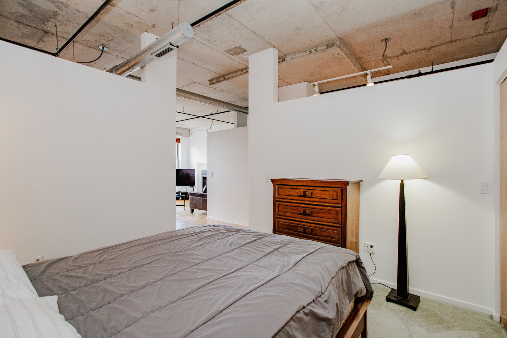 6 South Laflin Street, Unit 617 Chicago, IL 60607 - Photo 12 of 21 a bedroom with a bed and a closet