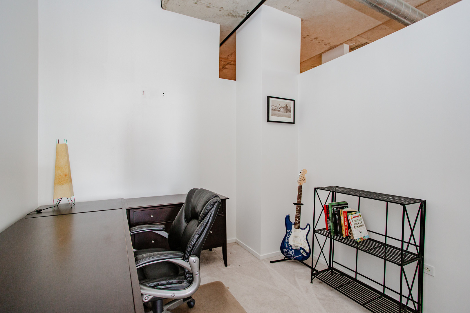 6 South Laflin Street, Unit 617 Chicago, IL 60607 - Photo 13 of 21 a view of a workspace with furniture and a window