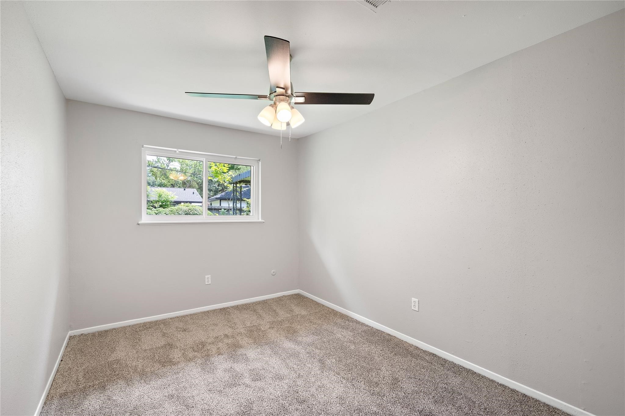 6007 Claridge Drive Houston, TX 77096 - Photo 16 of 38 an empty room with a window