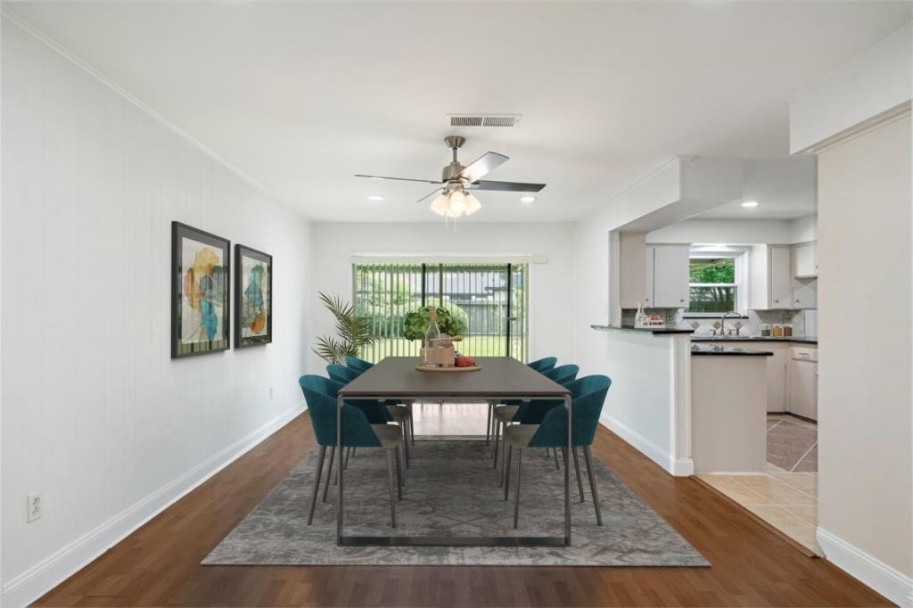 6007 Claridge Drive Houston, TX 77096 - Photo 3 of 38 a dining room with furniture and window