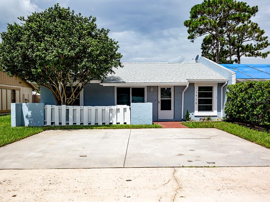 1958 Spring Street Winter Park, FL 32792 - Photo 1 of 1 Exterior Front with over sized parking pad.
