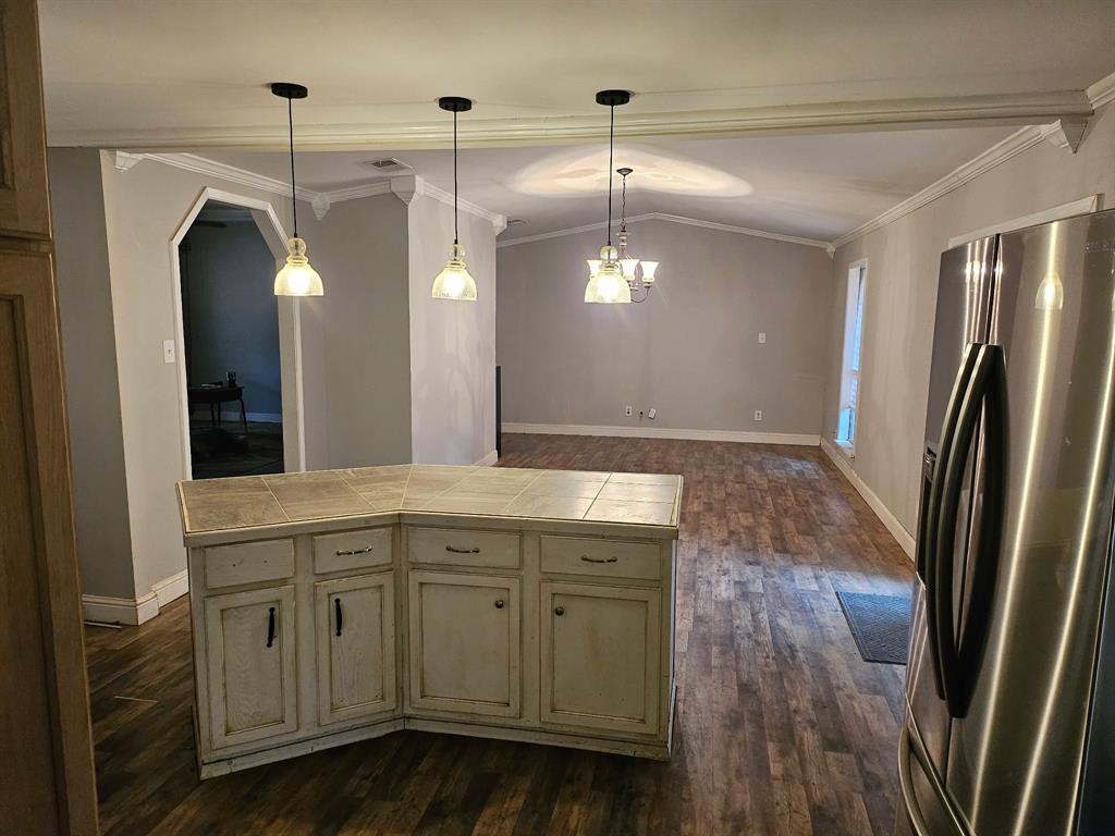 1088 Pheasant Road Gladewater, TX 75647 - Photo 7 of 31 a bathroom with a double vanity sink and a mirror
