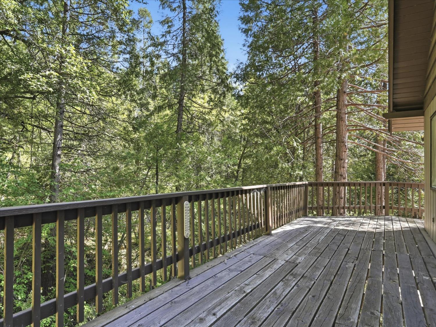 45167 Tolladay Road Oakhurst, CA 93644 - Photo 28 of 50 a view of balcony with wooden floor and fence