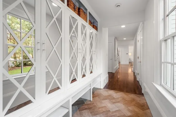 a view of entryway with wooden floor