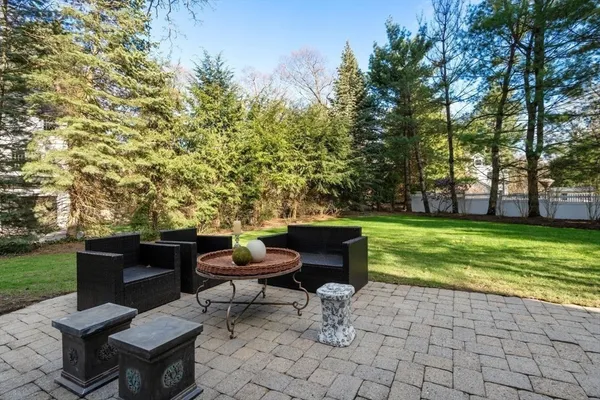 a view of a yard with furniture