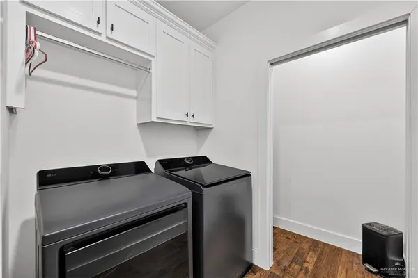 a view of a kitchen with an empty shelf