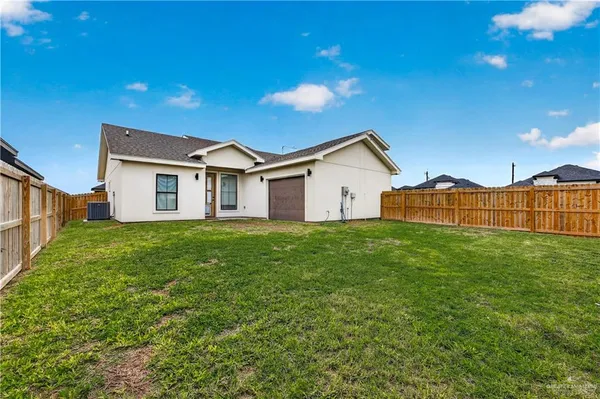 a view of a house with a big yard