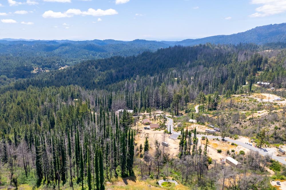 1300 Pinecrest Drive Boulder Creek, CA 95006 - Photo 5 of 18 a view of lake with mountain