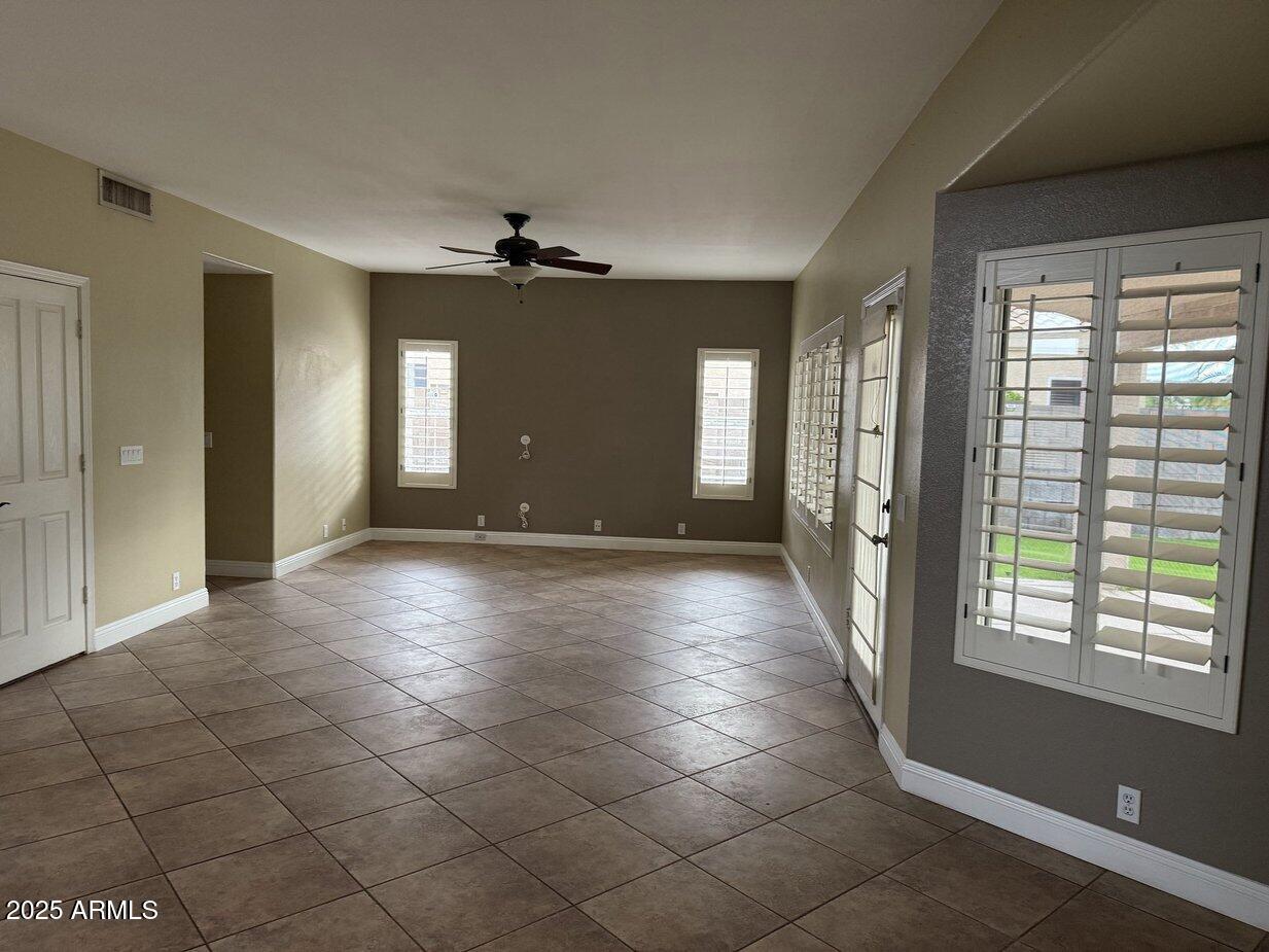 6079 West Irma Lane Glendale, AZ 85308 - Photo 9 of 33 a view of a livingroom with a staircase