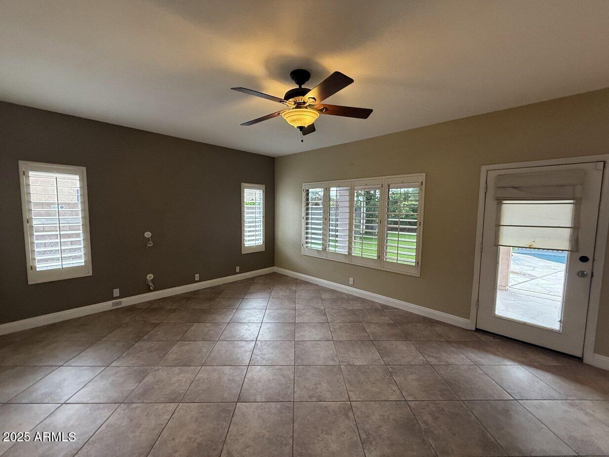 6079 West Irma Lane Glendale, AZ 85308 - Photo 10 of 33 a view of an empty room with a window