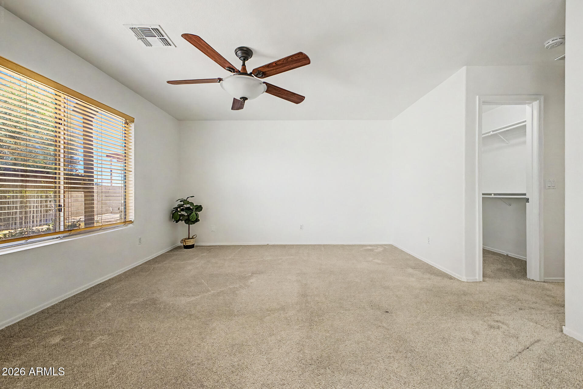 2762 North Ricardo Mesa, AZ 85215 - Photo 24 of 38 a view of an empty room with a window