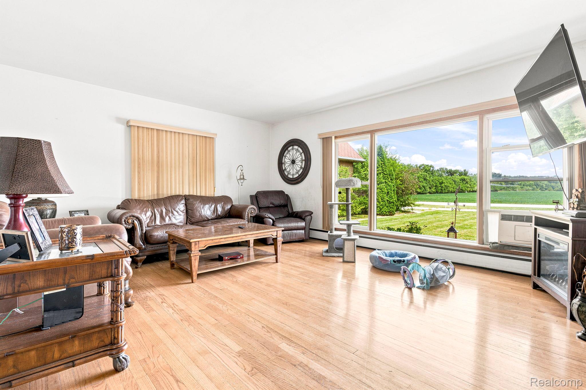 9735 Dolan Road Columbus, MI 48063 - Photo 20 of 63 Expansive picture window offering broad exterior landscape