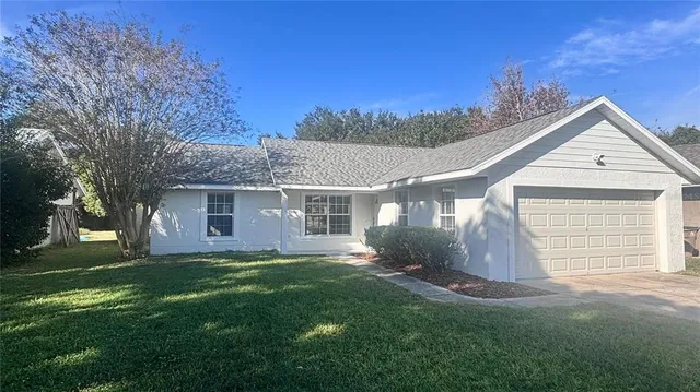 front view of a house with a yard