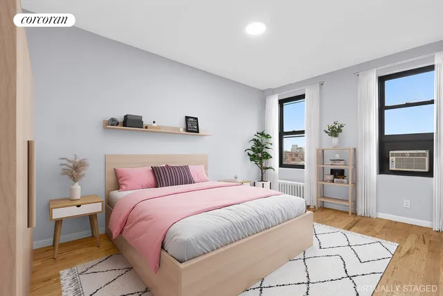 a bedroom with a large bed and a book shelf