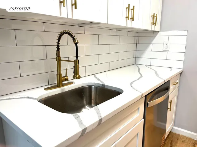 a view of a sink and tub