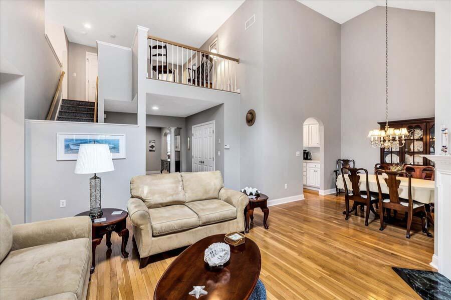 24 Stratford Ridge Mashpee, MA 02649 - Photo 26 of 50 a living room with furniture and wooden floor