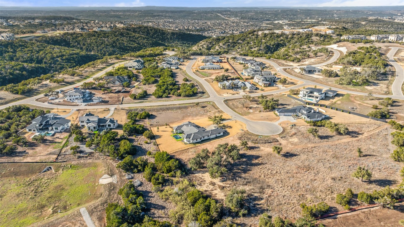 17105 Morning Grove Lane Austin, TX 78738 - Photo 7 of 21 an aerial view of residential houses with outdoor space