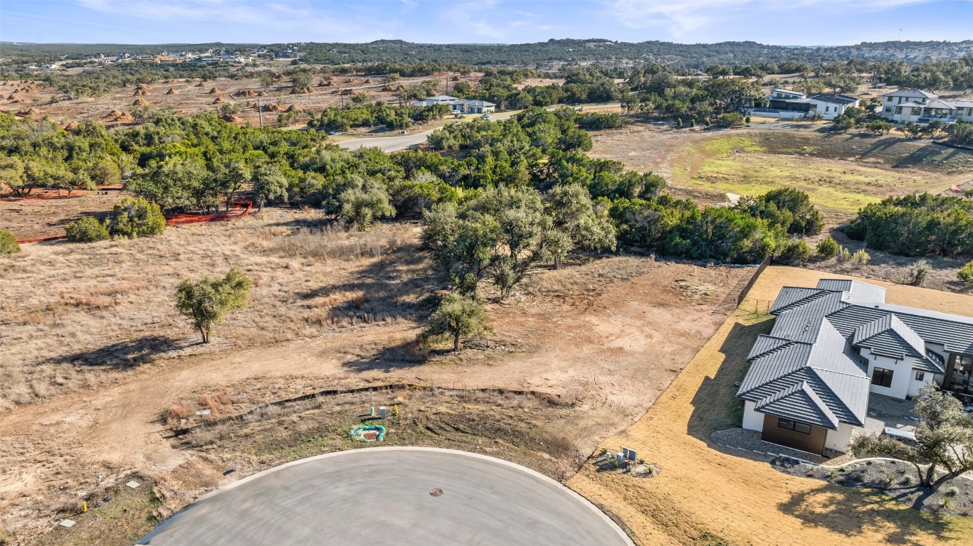 17105 Morning Grove Lane Austin, TX 78738 - Photo 9 of 21 an aerial view of a house with a yard