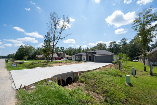 a view of a backyard with garden