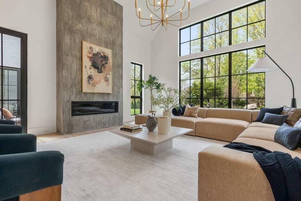 279 Fuller Street Newton, MA 02465 - Photo 23 of 42 a living room with furniture and a large window