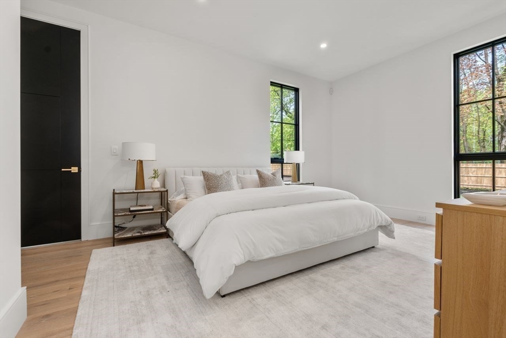 279 Fuller Street Newton, MA 02465 - Photo 27 of 42 a bedroom with a bed and a window