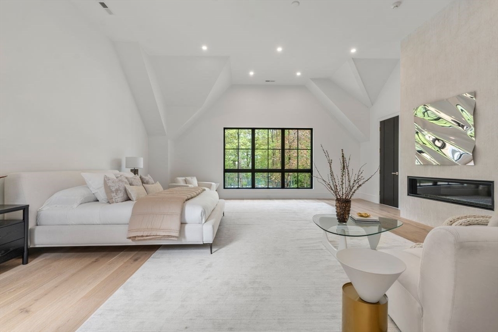 279 Fuller Street Newton, MA 02465 - Photo 32 of 42 a living room with furniture and a large window