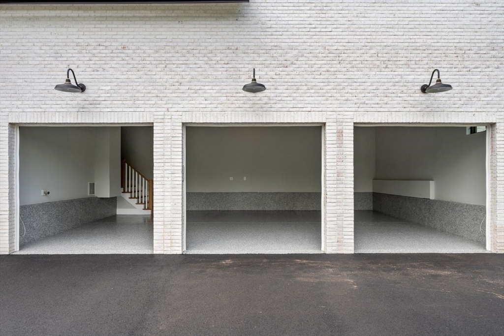 279 Fuller Street Newton, MA 02465 - Photo 38 of 42 a view of a kitchen with a sink and a mirror