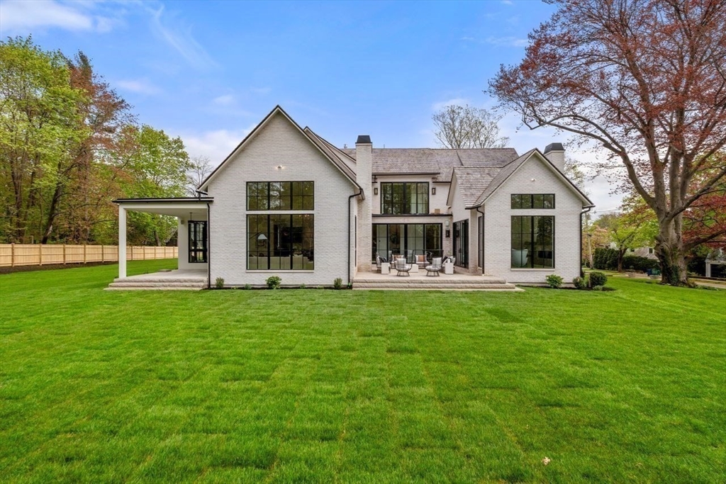 279 Fuller Street Newton, MA 02465 - Photo 40 of 42 front view of a house with a garden