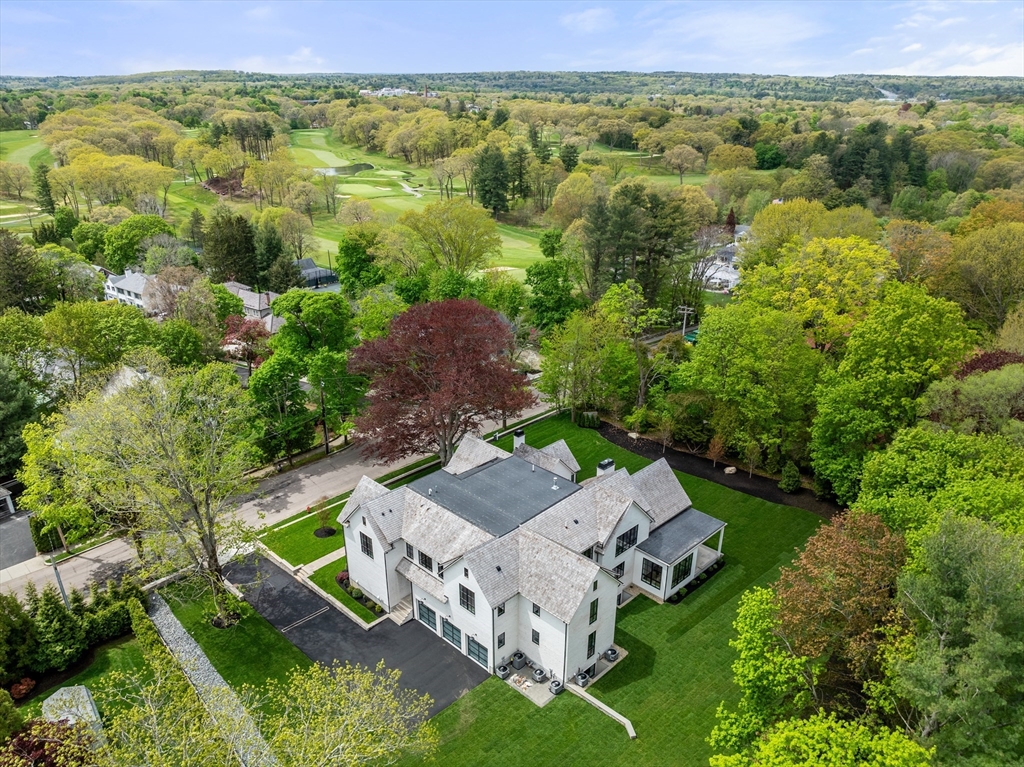 279 Fuller Street Newton, MA 02465 - Photo 42 of 42 an aerial view of a house with a yard