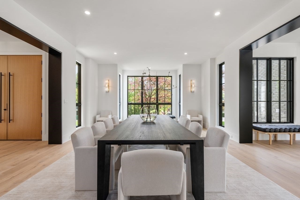 279 Fuller Street Newton, MA 02465 - Photo 10 of 42 a dining room with a table chairs and entryway