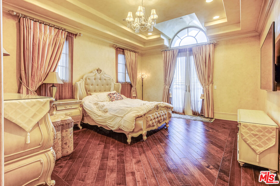 8336 Lexington Road Downey, CA 90241 - Photo 32 of 49 a bedroom with a bed dresser and a window