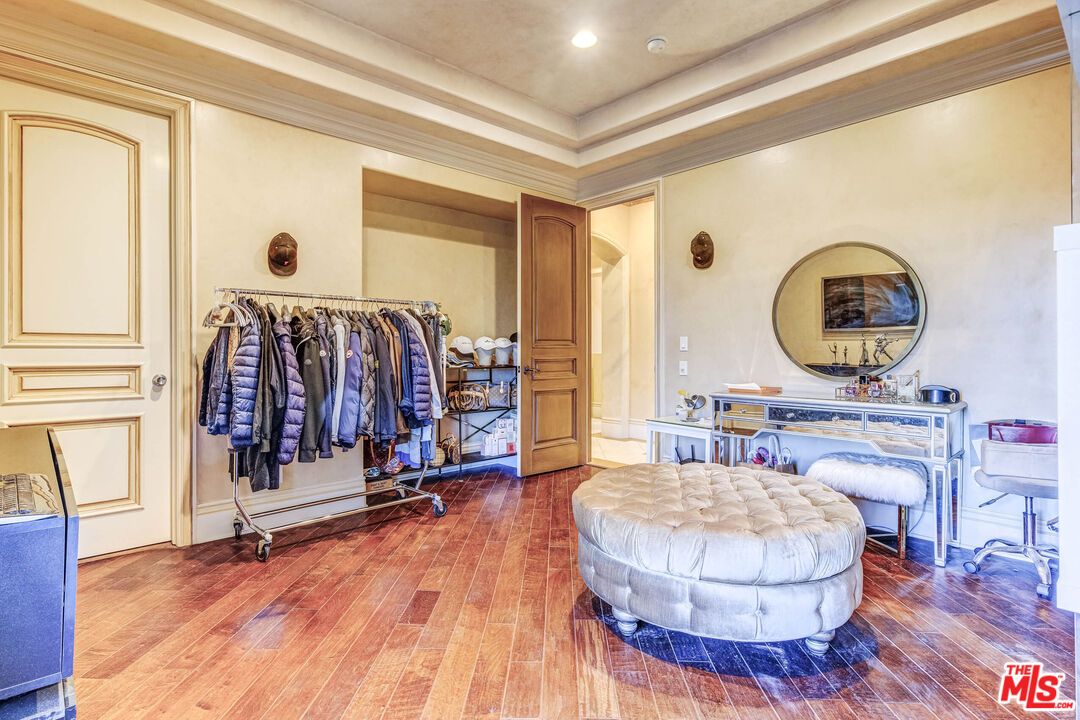 8336 Lexington Road Downey, CA 90241 - Photo 33 of 49 a living room with furniture and wooden floor