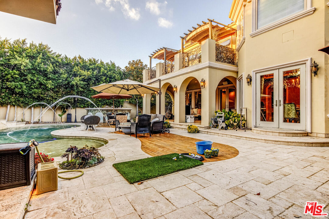 8336 Lexington Road Downey, CA 90241 - Photo 37 of 49 a front view of a house with swimming pool having outdoor seating