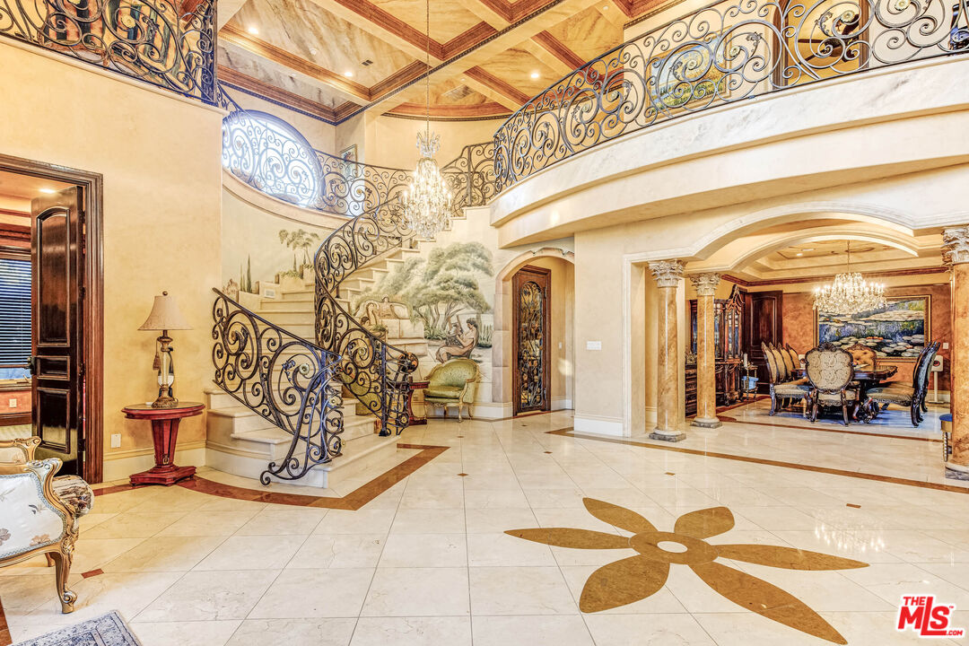 8336 Lexington Road Downey, CA 90241 - Photo 4 of 49 a view of entryway with a chandelier