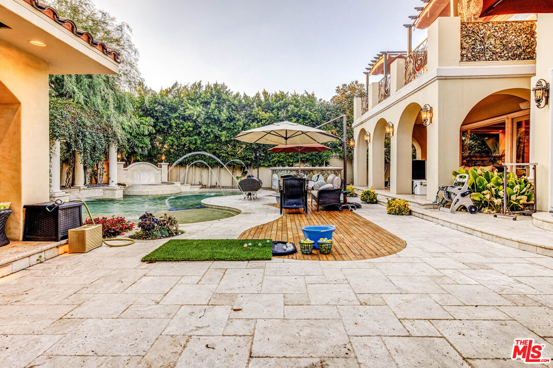 8336 Lexington Road Downey, CA 90241 - Photo 42 of 49 a view of a building with garden and patio