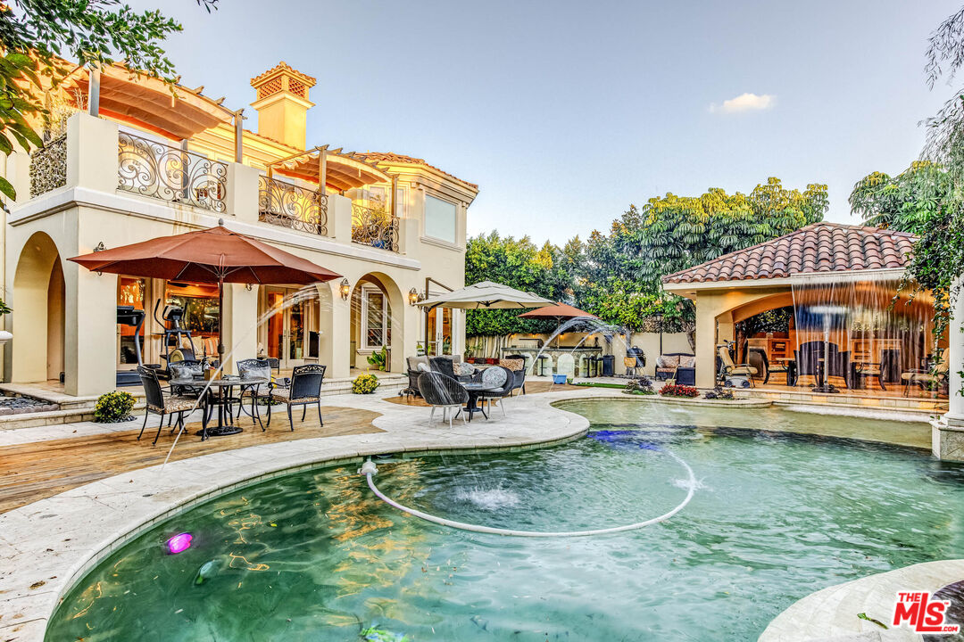 8336 Lexington Road Downey, CA 90241 - Photo 43 of 49 an outdoor space with swimming pool and furniture