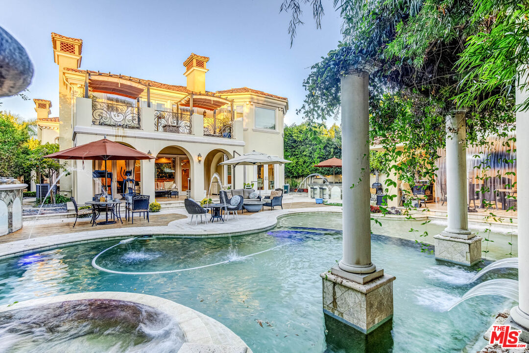 8336 Lexington Road Downey, CA 90241 - Photo 44 of 49 a view of a house with sitting area and garden