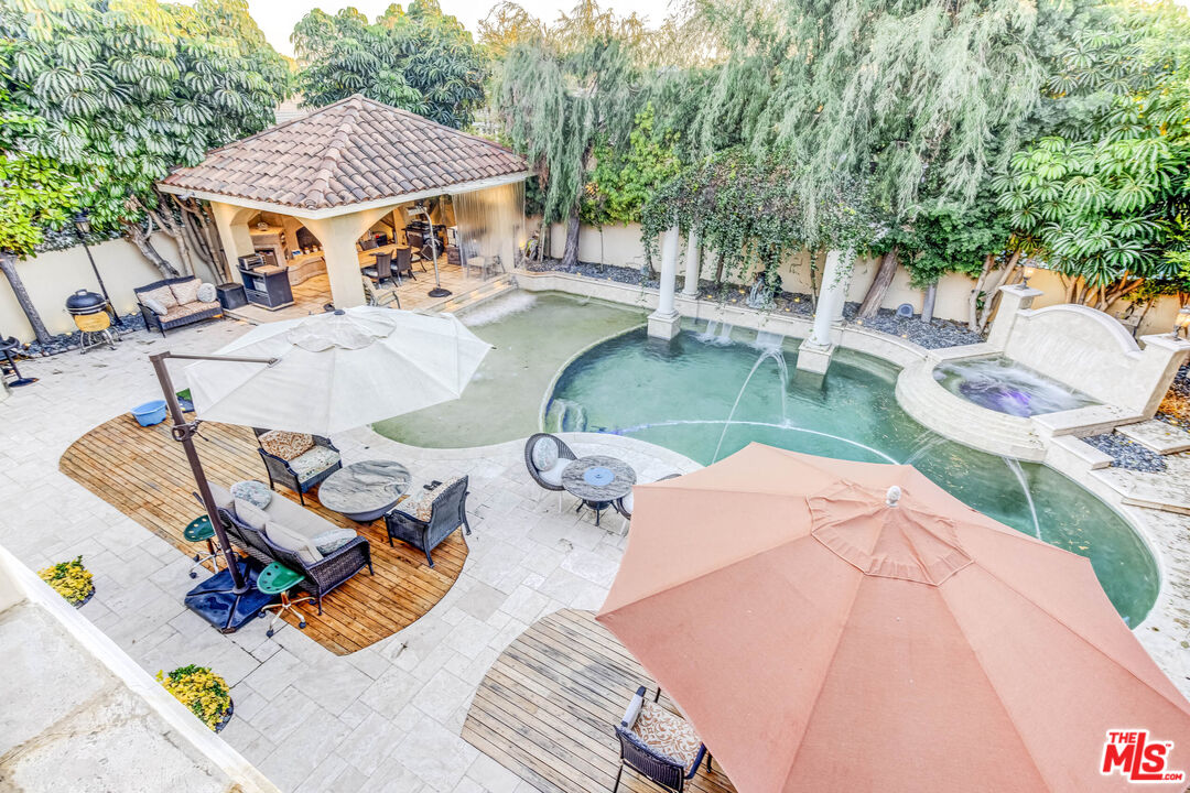 8336 Lexington Road Downey, CA 90241 - Photo 45 of 49 swimming pool view with a seating space