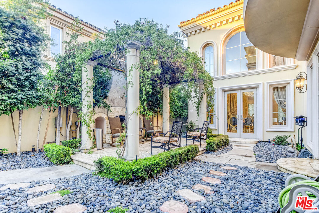 8336 Lexington Road Downey, CA 90241 - Photo 47 of 49 a view of a house with backyard and sitting area