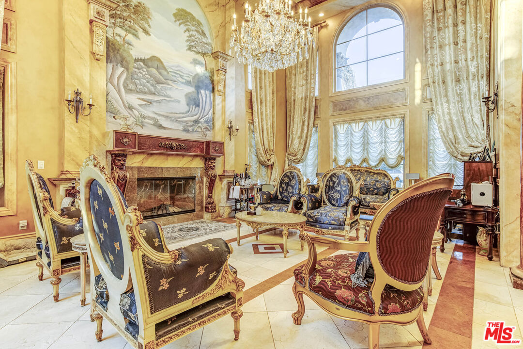 8336 Lexington Road Downey, CA 90241 - Photo 7 of 49 a view of a room with furniture and chandelier