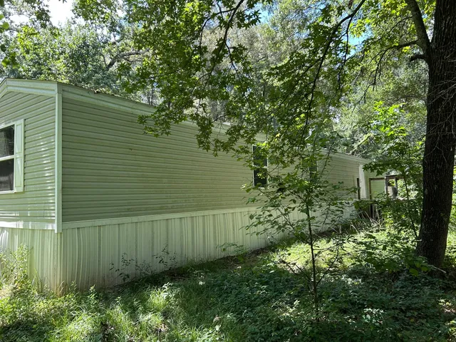 a view of a outdoor space in front of a house