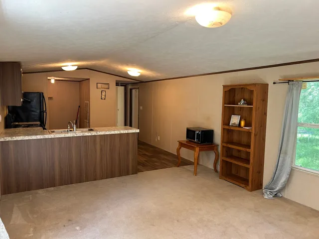 a view of a hallway with workspace